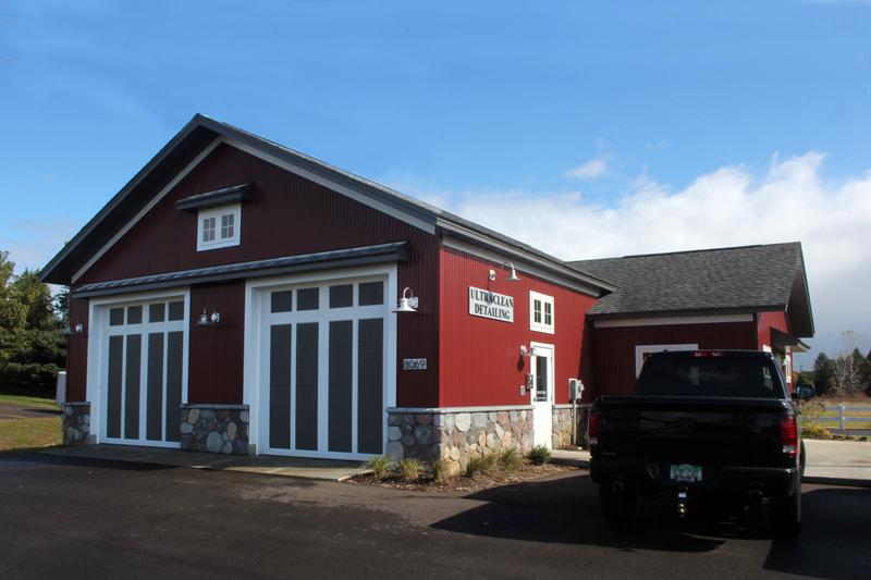 Commercial building exterior with landscaped entrance