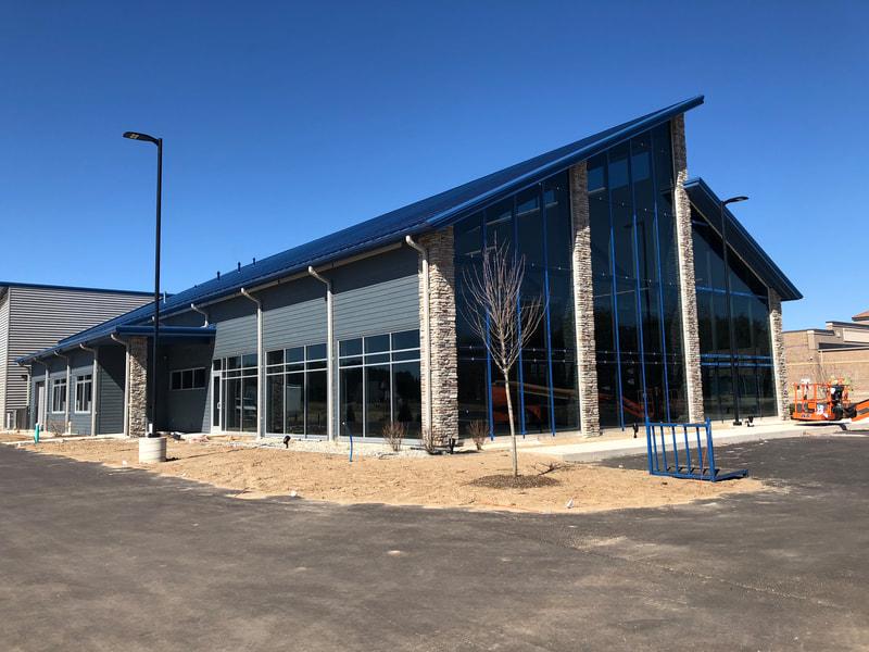 Modern glass-fronted commercial building designed by Bosch Architecture